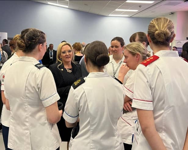 Amanda Martin with nurses at QA Hospital