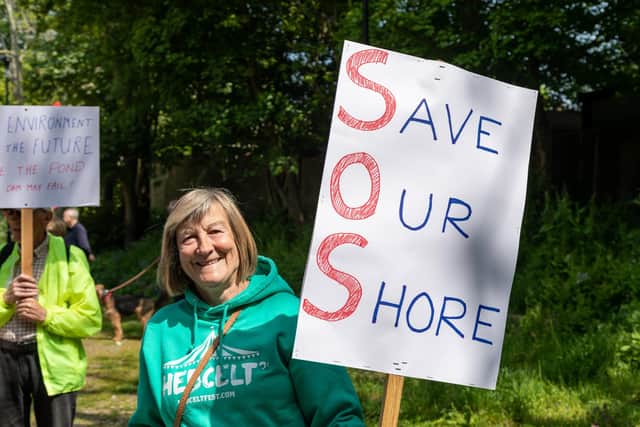 Protestors at the march to save the sea defences and Langstone mill pond Picture: Mike Cooter (150523)