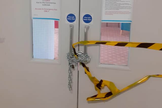 The door to the lounge at Sydenham Court in Berkshire Close, Fratton, has been chained shut blocking access to a fire exit through the room shared by residents. It has been shut due to coronavirus restrictions in place. Residents at the 1982 block with 96 flats are unhappy about the risk this could cause.
Picture: Les Cummings