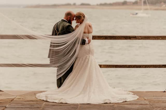 Stephanie and Adam Bygrave-White, from Fratton, were married at the Square Tower, in Old Portsmouth on August 22, 2022. Picture: Carla Mortimer Photography.