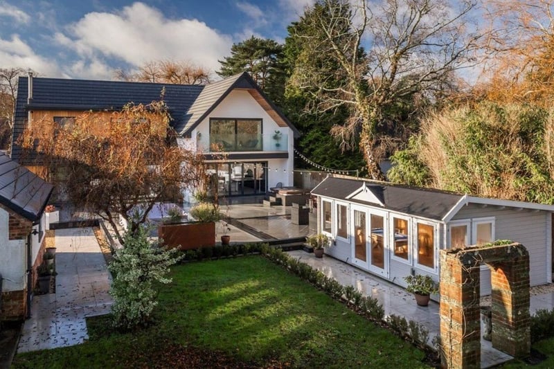 The listing says: "Upon entering the property, you are instantly impressed by the spacious, light and bright reception hallway which has an open line of sight through the house and out of the bifold doors to the rear garden."
