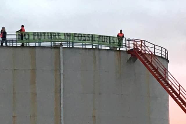 Extinction Rebellion of protesters who have broken into Fawley Oil terminal. Pic: Extinction Rebellion/PA Wire