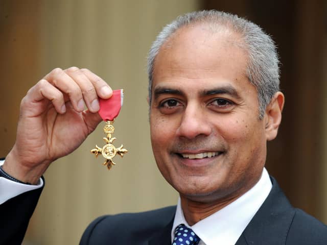George Alagiah at Buckingham Palace after collecting his OBE from the Queen.