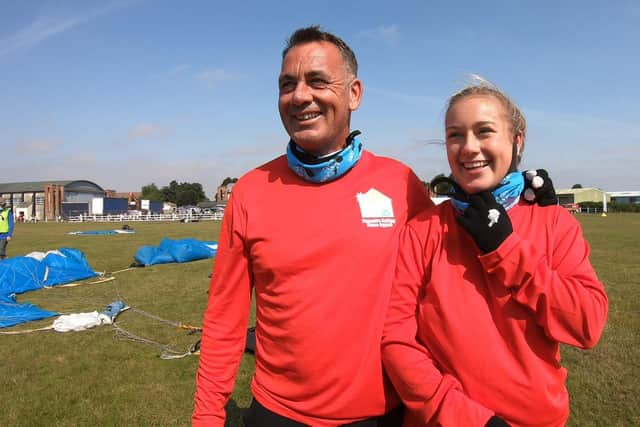 Two fundraising events have given a huge boost to charity Hannah's Holiday Home. Pictured: Lea Jackson with his daughter Jessica, 21, on the day of their parachute jump