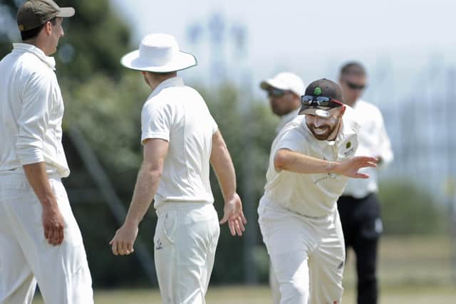 Elbow bumps only for Burridge players after the fall of a Portsmouth wicket. Picture Ian Hargreaves