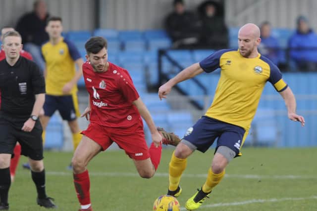 Gosport's Mike Carter, right, has dual-signed with AFC Portchester as he continues his recovery from a knee injury. Picture: Ian Hargreaves