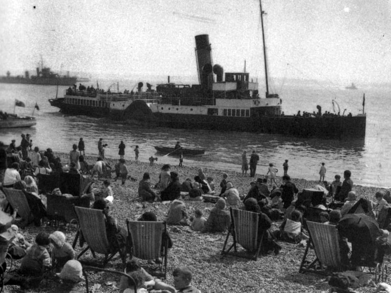 The paddle steamer Merstone is admired by holidaymakers on Southsea beach between the wars
