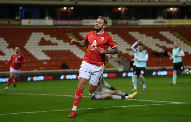 James Norwood opens the scoring for Barnsley (Photo by Michael Regan/Getty Images)