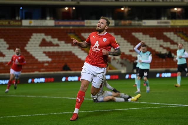 James Norwood opens the scoring for Barnsley (Photo by Michael Regan/Getty Images)