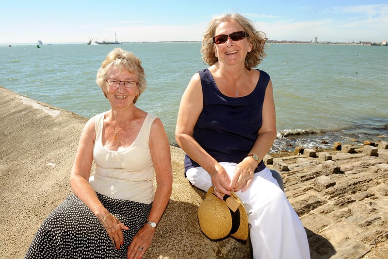 People of Portsmouth headed down to Southsea seafront to enjoy the hot weather on Tuesday 23rd August 2016. 
Pictured is: (l-r) Carol Jones (72) from Farlington, and Jean McQuoid (73) from Southsea.
Picture: Sarah Standing (161130-1506)