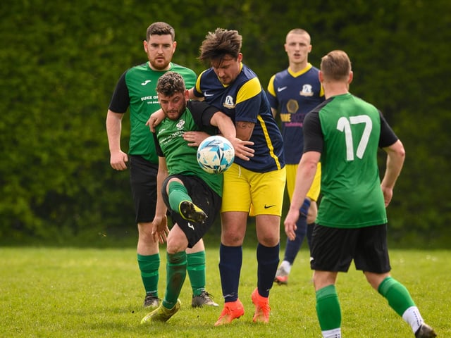 Action from Saturn Royale's 1-0 win over Pelham Arms (blue and yellow kit) in the second Adelaide Cup semi-final. Picture: Keith Woodland (300421-591)