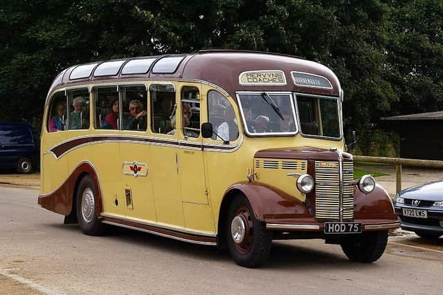 A vintage coach has been hired for veterans and esteemed guests.