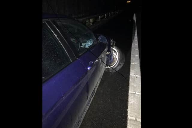 Police are investigating a crash that saw a car drive down the M27 on three wheels.