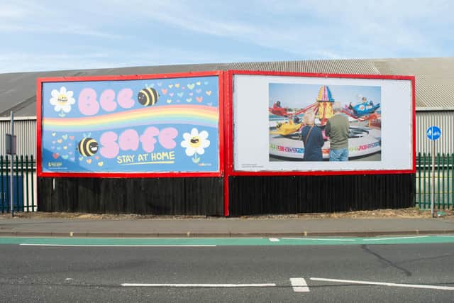 The billboards along Goldsmith Avenue, across the street from the Lidl supermarket, have been transformed by local artists, with graphic designer Ooberla's bee-themed design (left) and Karl Bailey's funfair photograph (right) brightening up the area.