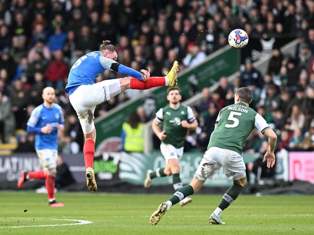 Ryan Tunnicliffe makes an aerial clearance in the second half of Pompey's Home Park defeat. Picture: Graham Hunt/ProSportsImages