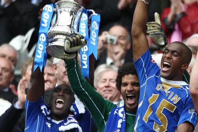 David James (middle) wants to follow his fellow Portsmouth FA Cup winner Sol Campbell (left) into management in England.