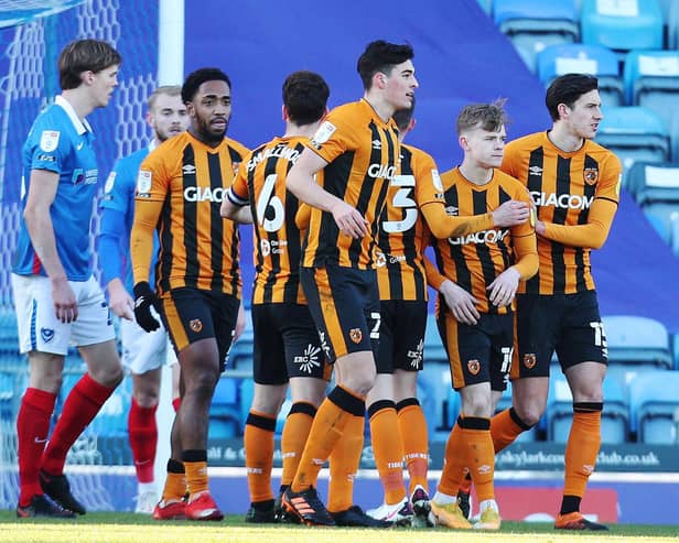 Hull celebrate their opener at Fratton Park.  Picture: Joe Pepler.