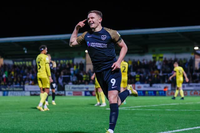 Colby Bishop celebrates his goal at Burton