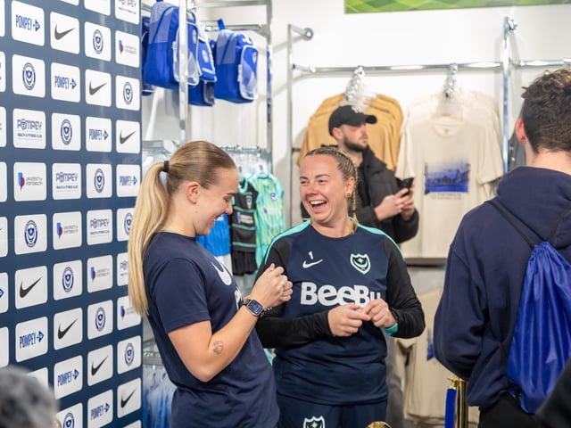 Ella Humphrey (winger, 20) and Hannah Haughton (keeper, 32) from Portsmouth FC Ladies greet shoppers at the new Pompey Store in Gunwharf Quays. Picture: Mike Cooter (011124)