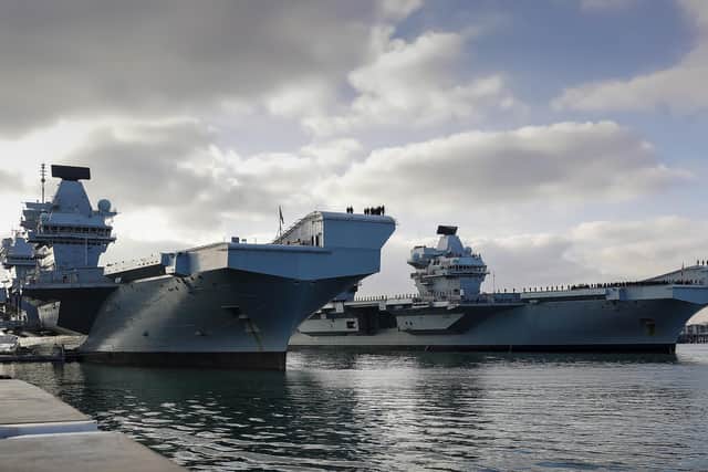 HMS Queen Elizabeth and HMS Prince of Wales, Britain's aircraft carriers, come together in their home port of Portsmouth for the first time. This image won Best Maritime Image. By Leading Photographer Ben Corbett