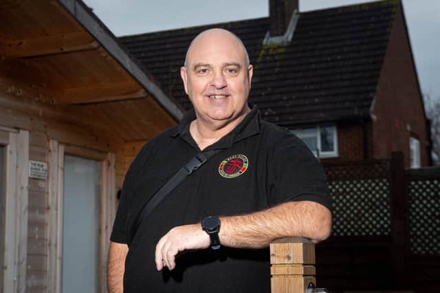 Graham Street has been awarded a British Empire Medal for his services to charity, having worked with Charlie's Beach Hut Pictured: Graham Street in his home in Cosham, Portsmouth on 29 December 2020.Picture: Habibur Rahman