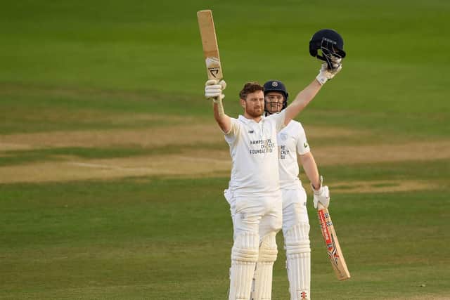 Vince celebrates a 100.