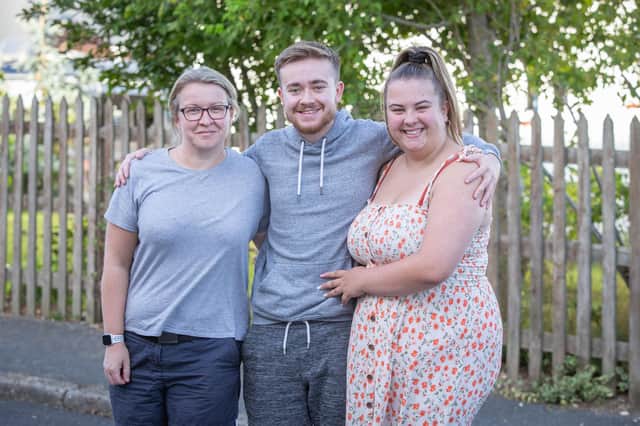 Tom Ingram outside his home in Cosham with Jen Whiteley, trustee and his girlfriend, Emily Weston on 21 August 2020.

Picture: Habibur Rahman