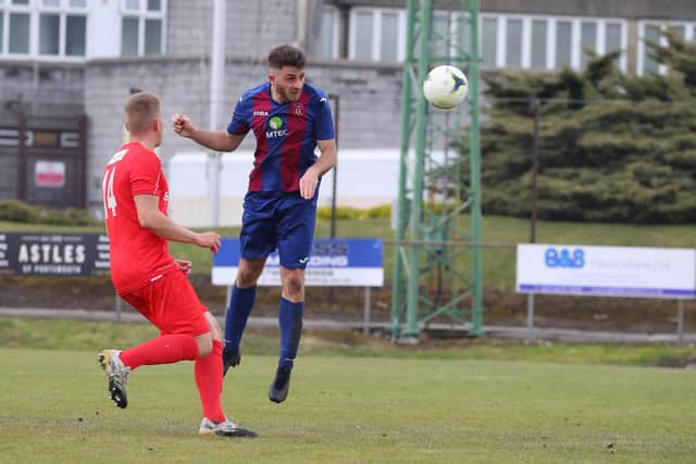 Harry Sargeant scores US Portsmouth's second goal against Flackwell Heath. Picture: Stuart Martin