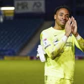 Delight for Pompey goalkeeper Josh Oluwayemi, who saved three penalties for Pompey in the shoot-out against AFC Wimbledon. Picture: Jason Brown/ProSportsImages