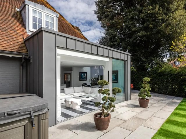 This property comes with ten bedrooms, eight bathrooms and five reception rooms as well as a huge garden.