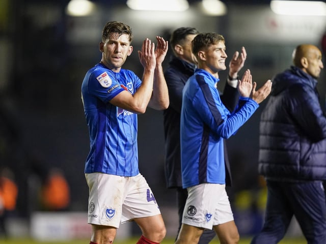 Callum Lang and Freddie Potts applaud the Fratton faithful at the final whistle.