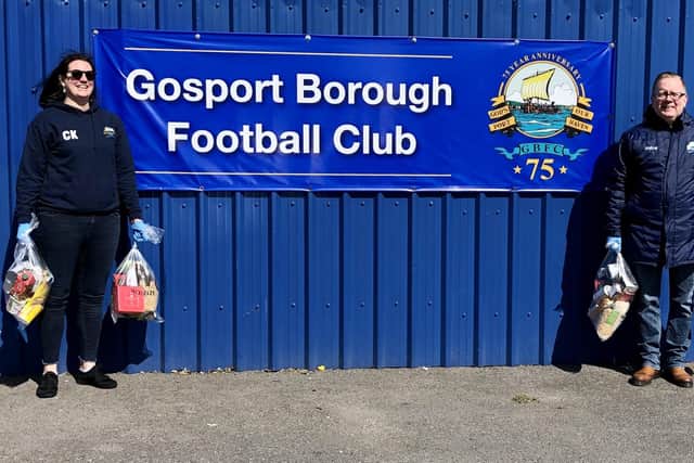 Gosport Borough FC volunteer Clare Kaznowski and club Covid-19 community response coordinator Keith Slater with food parcels donated by Aldi. Picture by Debra Redpath