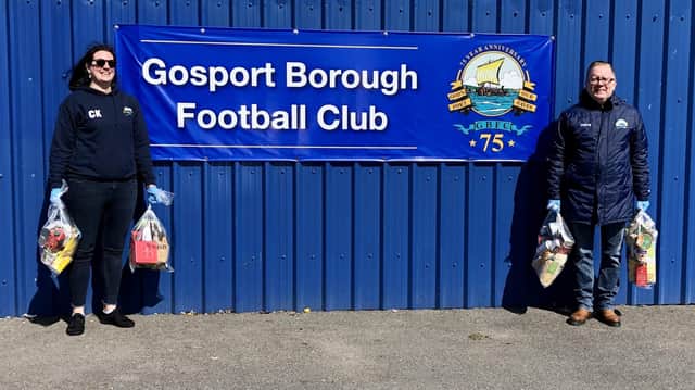 Gosport Borough FC volunteer Clare Kaznowski and club Covid-19 community response coordinator Keith Slater with food parcels donated by Aldi. Picture by Debra Redpath