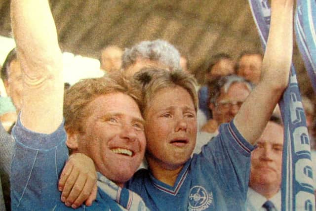 An emotional Jimmy Ball with dad Alan at Pompey's promotion party against Sheffield United in May 1987 - but there's a little-known story behind those tears. Picture: Murray Sanders