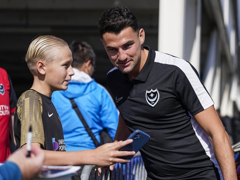 Regan Poole poses for a selfie with a young Blues supporter