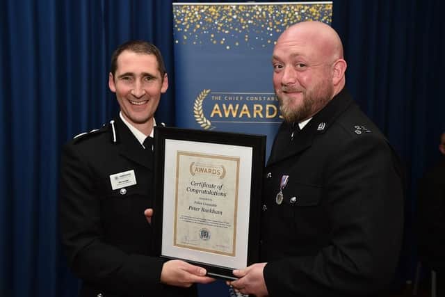 Police Sergeant Peter Rackham (right) with acting Chief Constable Ben Snuggs. Picture: Hampshire and Isle of Wight Constabulary