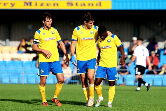 Abdulai Baggie, right, is congratulated after his goal. Picture by Tom Phillips