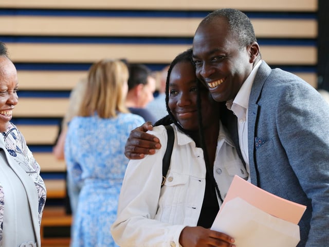 Naomi Quartsin opens her results with her father and her great aunt, A-level results, Portsmouth High School, Southsea
Picture: Chris Moorhouse (jpns 180822-09)