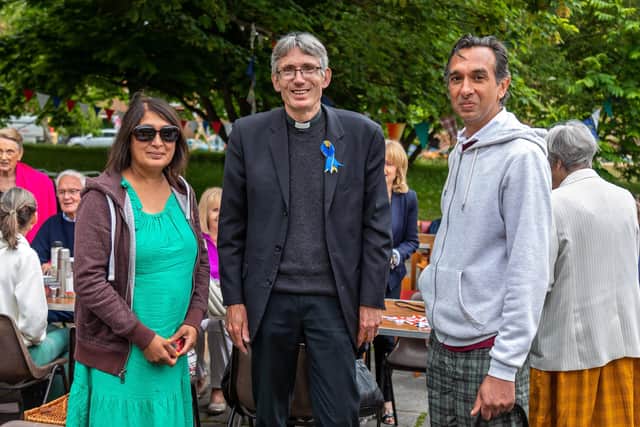 Anthony Cane (Dean of Portsmouth, centre) with Susan Hill and Gurbinder Kalirai at the Portsmouth Cathedral street party. Picture: Mike Cooter (050622)