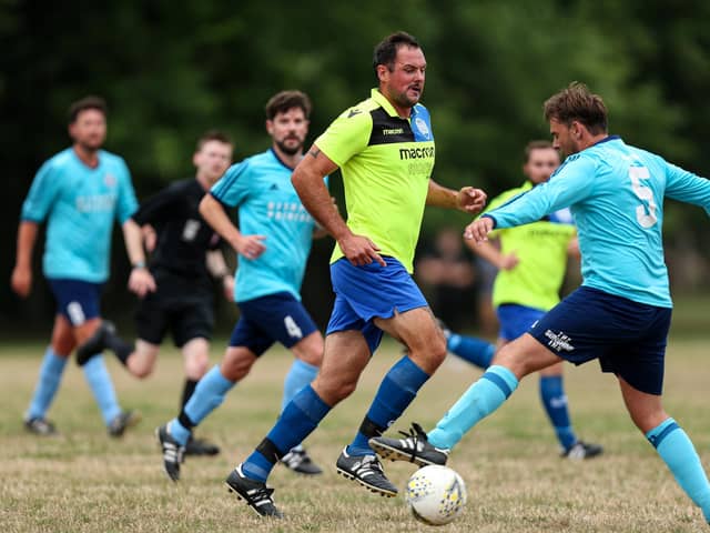 Luke Steere, centre, netted Harvest's late winner against Meon Milton that secured runners-up spot in Division 1 South East of the Hampshire Premier League.
Picture: Chris Moorhouse