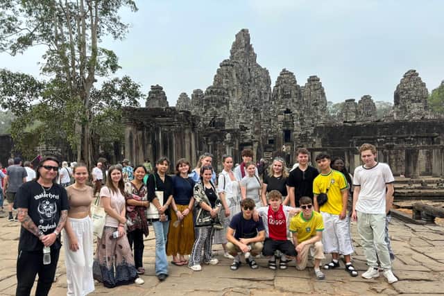 Students and staff seen at Angkor Wat temple.