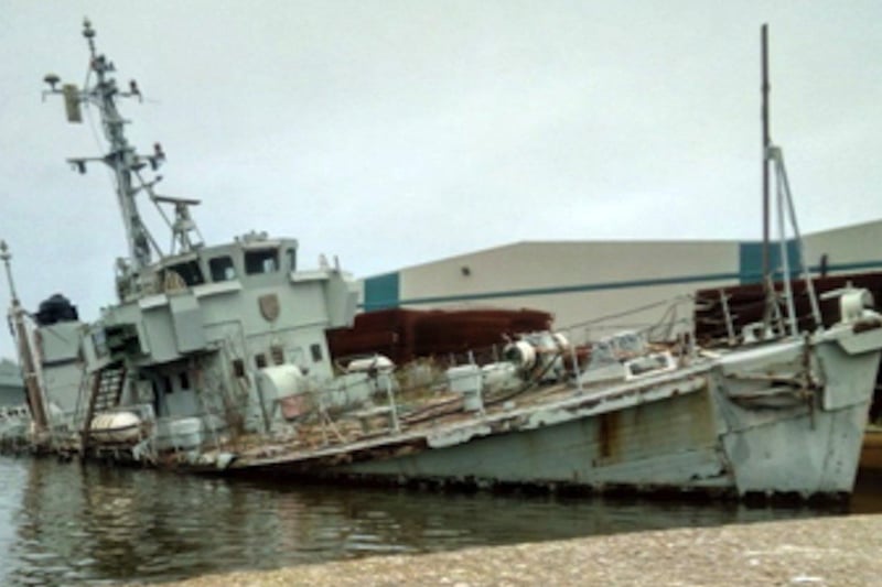 HMS Bronington submerged in docks on the Mersey Picture: Navy News/ Mike McBride collection