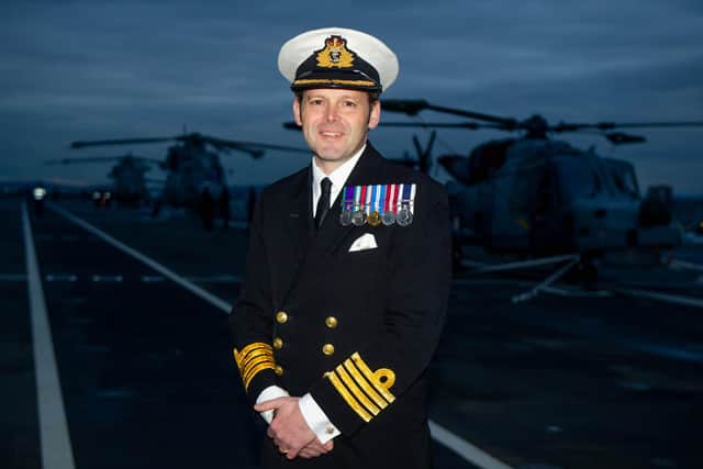 Captain Darren Houston, commanding officer of HMS Prince of Wales, pictured during the ship's first arrival in Portsmouth last year. 

Picture: Habibur Rahman