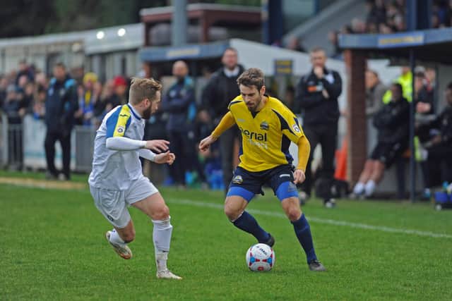 Rory Williams, right, takes on Ben Swallow at Privett Park on Boxing Day, 2015. Picture Ian Hargreaves