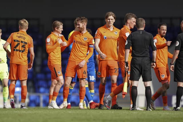 Pompey  celebrate their win at AFC Wimbledon. Picture: Jason Brown