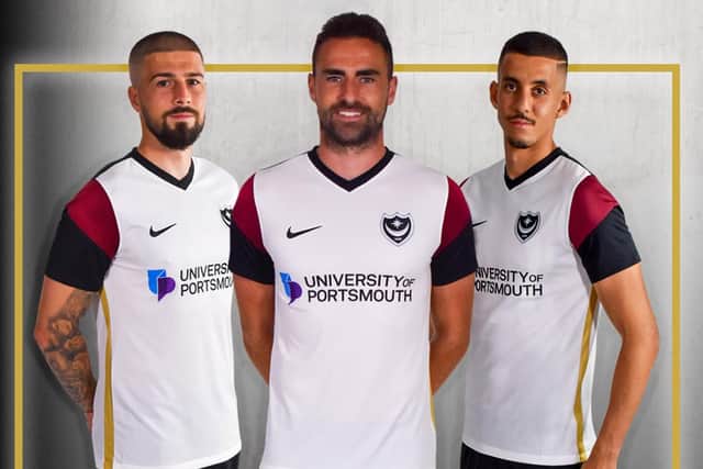 Kieron Freeman, Clark Robertson and Gassan Ahadme show off the new away shirt. Picture: Portsmouth FC