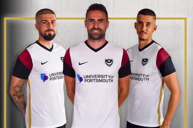Kieron Freeman, Clark Robertson and Gassan Ahadme show off the new away shirt.  Picture: Portsmouth FC