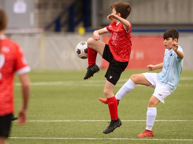 Pictured is: Action from the Portsmouth Youth League Cup Final, U13 Jubilee 77 v Castle Utd, (Light Blue and White) Geldard Invitation Cup.Picture: Keith Woodland (190321-556)