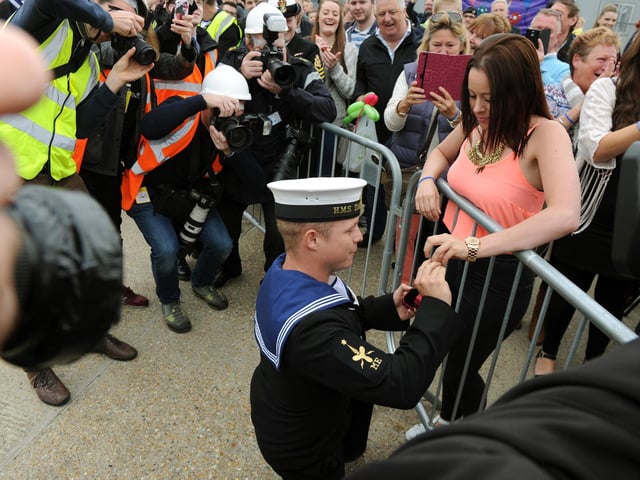 15th May 2015. Sam Luckett proposes to Danielle Cotton.
Home coming of HMS Dauntless at Portsmouth Dockyard, Portsmouth.
Picture: Allan Hutchings (150741-022)