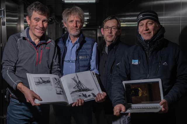 Photo issued by Falklands Maritime Heritage Trust of (left to right) John Shears, Expedition Leader, Mensun Bound, Director of Exploration, Nico Vincent, Expedition Sub-Sea Manager, J.C. Caillens, Off-Shore Manager, holding the first scan of the Endurance wreckage alongside photos from Frank Hurley, during the expedition to find the wreck of Endurance, Sir Ernest Shackleton's ship which has not been seen since it was crushed by the ice and sank in the Weddell Sea in 1915. Picture: Esther Horvath/Falklands Maritime Heritage Trust.